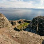 Stone beehive huts on Skellig Michael, with ocean backdrop. Experience Skellig Michael Tours from Portmagee. 