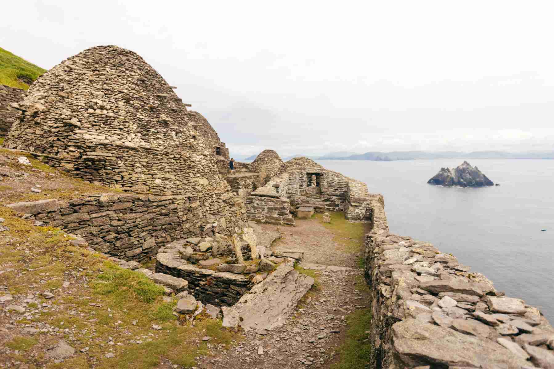 View of the ancient 6th-century beehive huts and monastic ruins on Skellig Michael perched above the Atlantic Ocean