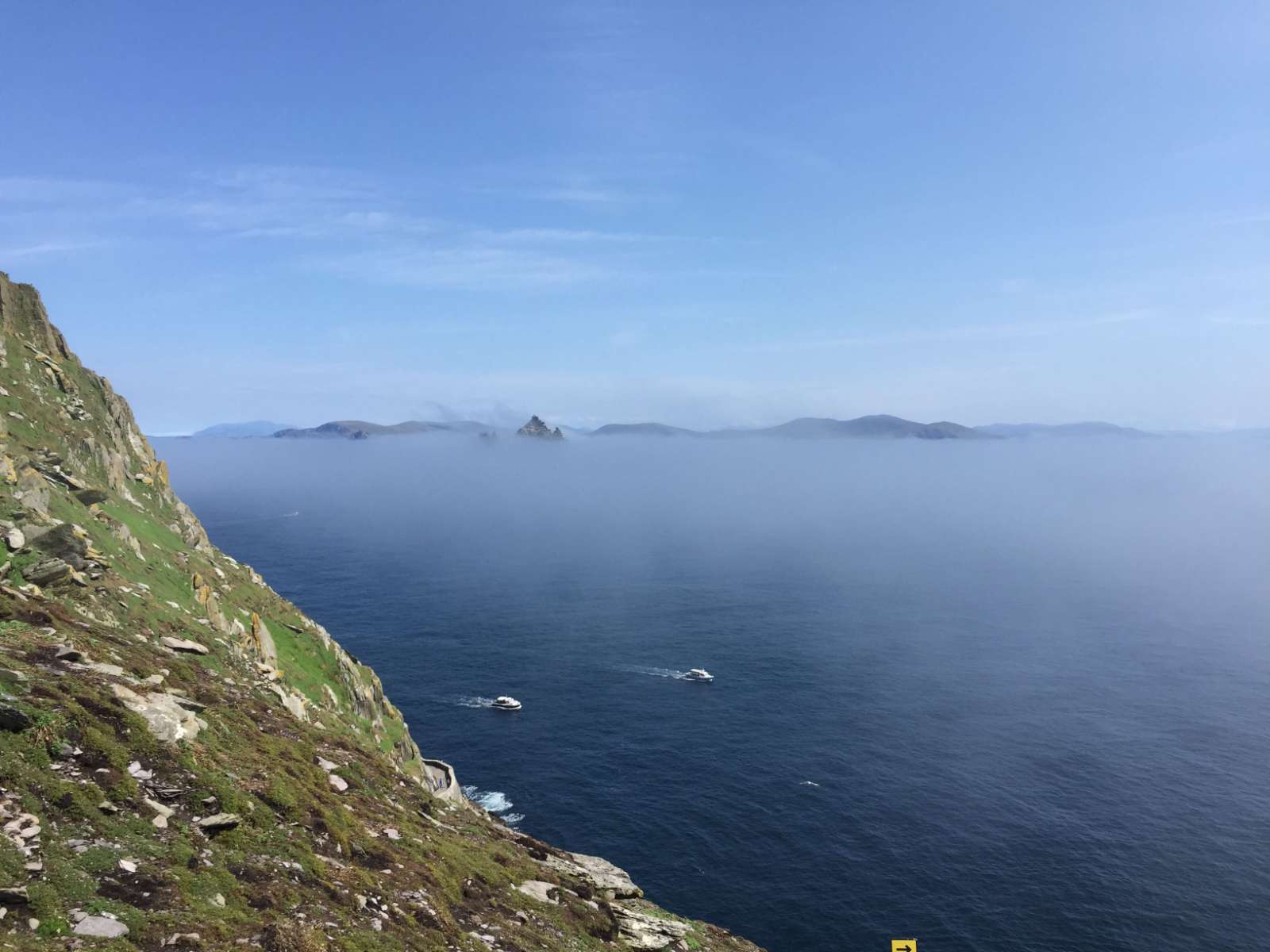 Ancient stone steps on Skellig Michael island with Atlantic Ocean views