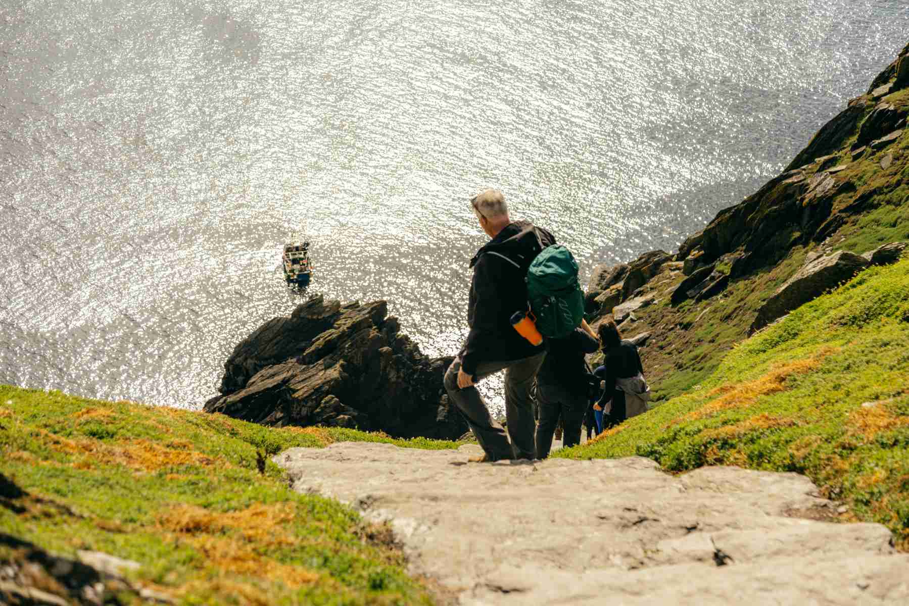 Hikers Ascending the Stone Steps