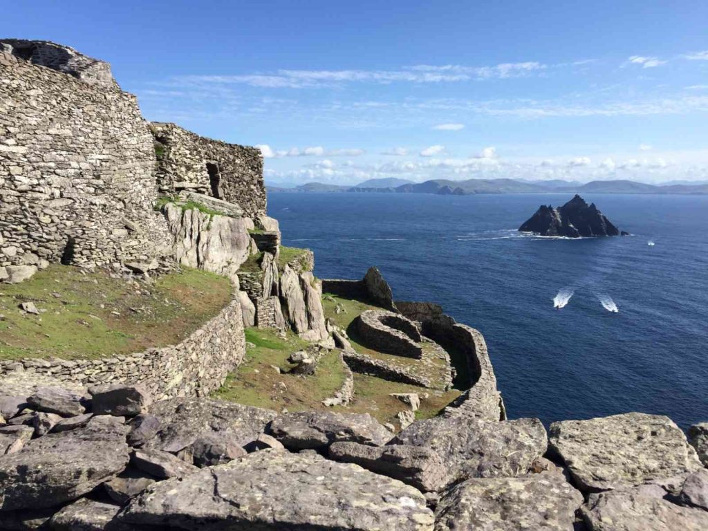 Why Skellig Michael is a UNESCO World Heritage Site Stone walls of the monastery on Skellig Michael, with the sea behind